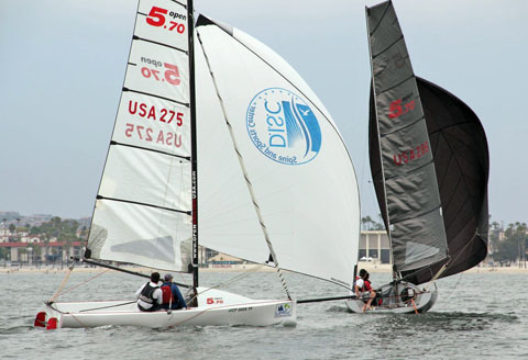 White boat and black boat