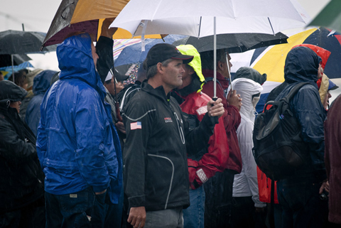 Russell Coutts under the umbrellas